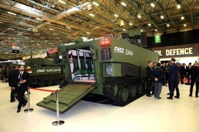                                                                 ZAHA �LK �IKARMASINI IDEF'TE YAPTI <br><br> T�rk savunma sanayi firmas� FNSS Savunma Sistemleri'nin Z�rhl� Amfibi H�cum Arac�n�n (ZAHA) �n prototipinin tan�t�m� yap�ld�.  <br><br> FNSS �st y�neticisi Nail Kurt, 14. Uluslararas� Savunma Sanayii Fuar�'nda (IDEF 2019) bulunan FNSS stand�nda ger�ekle�tirilen lansmanda ZAHA gibi ara�lar� az say�da �lkenin �retebildi�ini s�yledi.                                                        