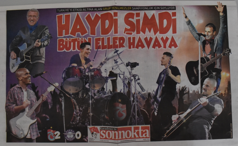 <p>Kulüp başkanı Ahmet Ağaoğlu, teknik direktör Abdullah Avcı ve bazı oyuncuların fotoğraflarının yer aldığı sayfadaki haberde, 'Türkiye'yi etkisi altına alan Grup Yenilmezler, şampiyonluk için söylüyor', 'Haydi şimdi bütün eller havaya' başlıkları yer alırken, arka sayfada ise 'Bize derler fırtına, ligde katarız tozu dumana' ve 'Sen ne harika bir sevdasın' ifadelerine yer verildi.<br></p>