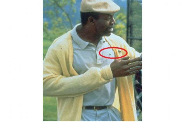 Happy Gilmore  Bir markann stste gelen iki amblemini tayan tirt ve hrka. 