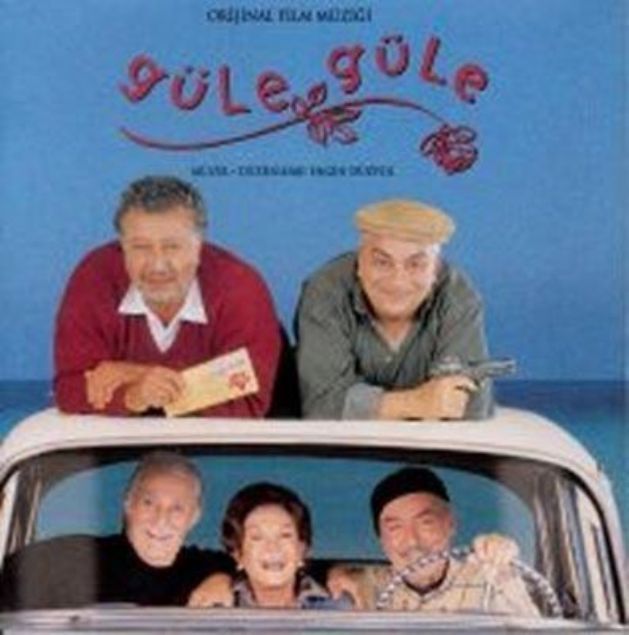 GLE GLE  Havaalanna giderken Zeki Alasya ile Metin Akpnar konuuyor. Zeki Alasya, arabann nnde oturuyor ve Florya sahil yolunda. Metin Akpnar, arka koltukta ve baka bir yerde.     