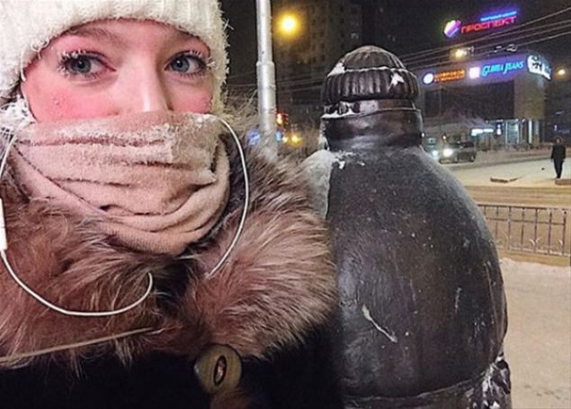   Rusya'nn Kuzey dousundaki Oymyakon kasabasnda halk, -71 dereceye ulaan souklarda hayatta kalmaya alyor.       