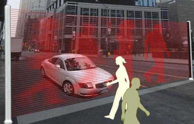 Gelecekte aralar daha da hzlanacak; yayalarla olas kaza riski de artacak. Yllar nce inli tasarmcnn gelitirdii hologram teknolojisi konsepti gerek olduunda krmzda gemek ok daha g olacak!   <br><br>  Yolun iki yanna koyulan sistem, yayalar getii srada hologram grnty yola yanstacak ve olas kazalarn nne geilecek.  