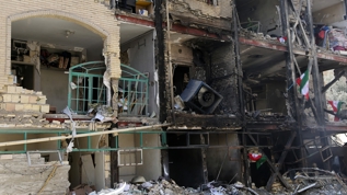 Tahran sokaklar� harabeye d�nd�: Soyk�r�mc� �srail'den a��r bombard�man