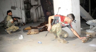 Tel Abyad'da tespit edildi! Havan ve roket deposu...